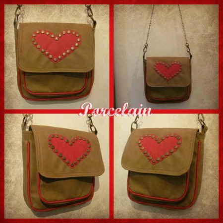 Art. 1036 Cartera con bolsillo externo color Suela y Rojo $210